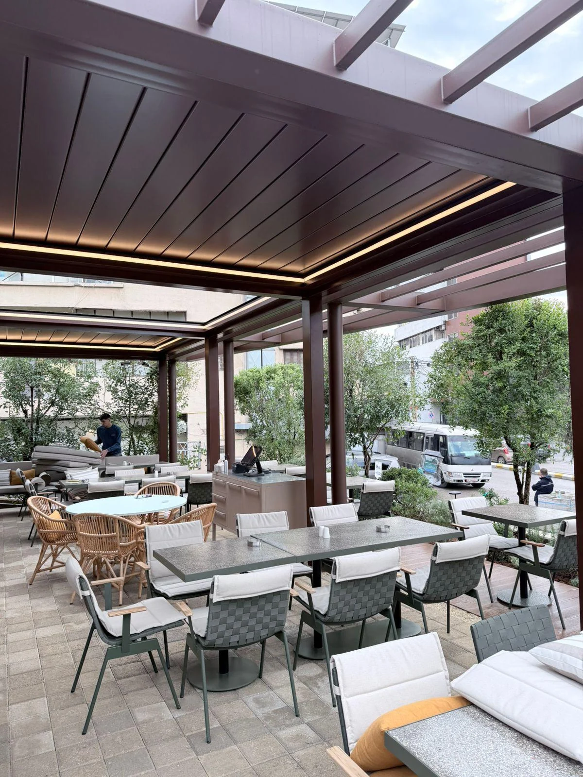 Wood-toned retractable restaurant roof